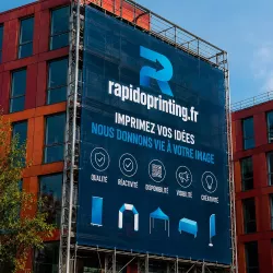Giant advertising banner for scaffolding for outdoor advertising during work